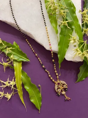 Modern Stylish Short Mangalsutra Designs AD Peacock Pendant With Latkan Gold And Black Beads Chain