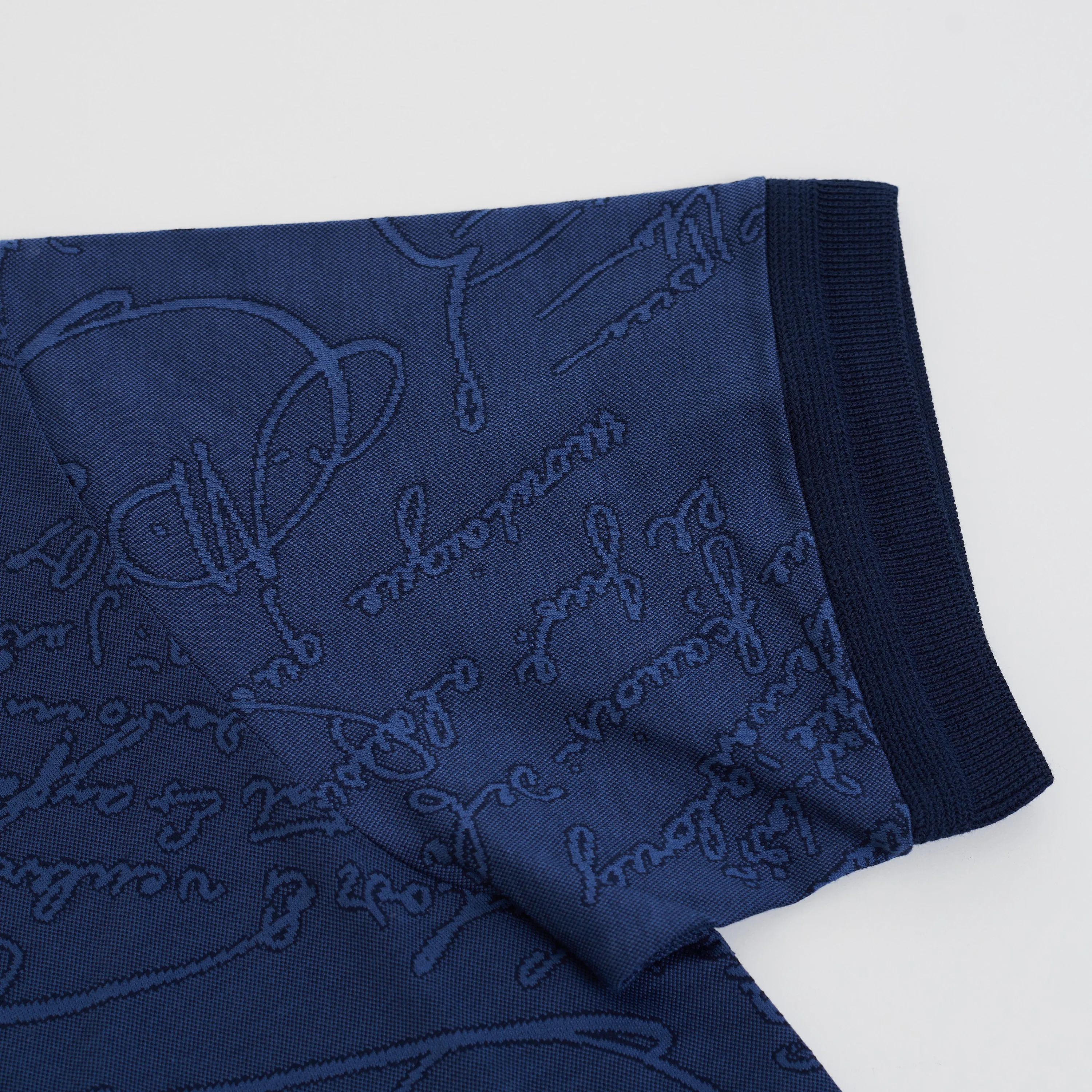 Polo-Shirt In Warm Blue All Over Scritto Jacquard Cotton